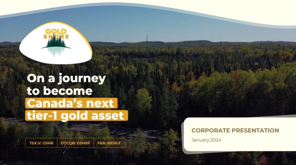 Werbebild von Gold Shore mit Luftaufnahme eines Waldgebiets, Text "On a journey to become Canada’s next tier-1 gold asset" und Angaben zu Börsenkürzeln.