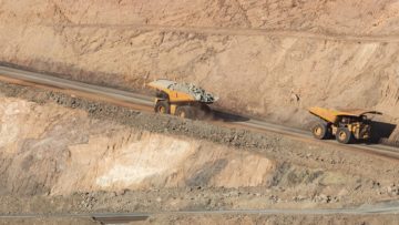 Trucks working in the Super Pit – a gold mine in Kalgoorlie, Western Australia