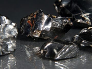 Closeup shot of fine gallium stones isolated on dark background