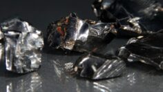 Closeup shot of fine gallium stones isolated on dark background